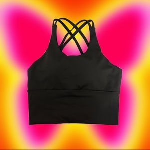 Super cute workout top with crisscross detailing!